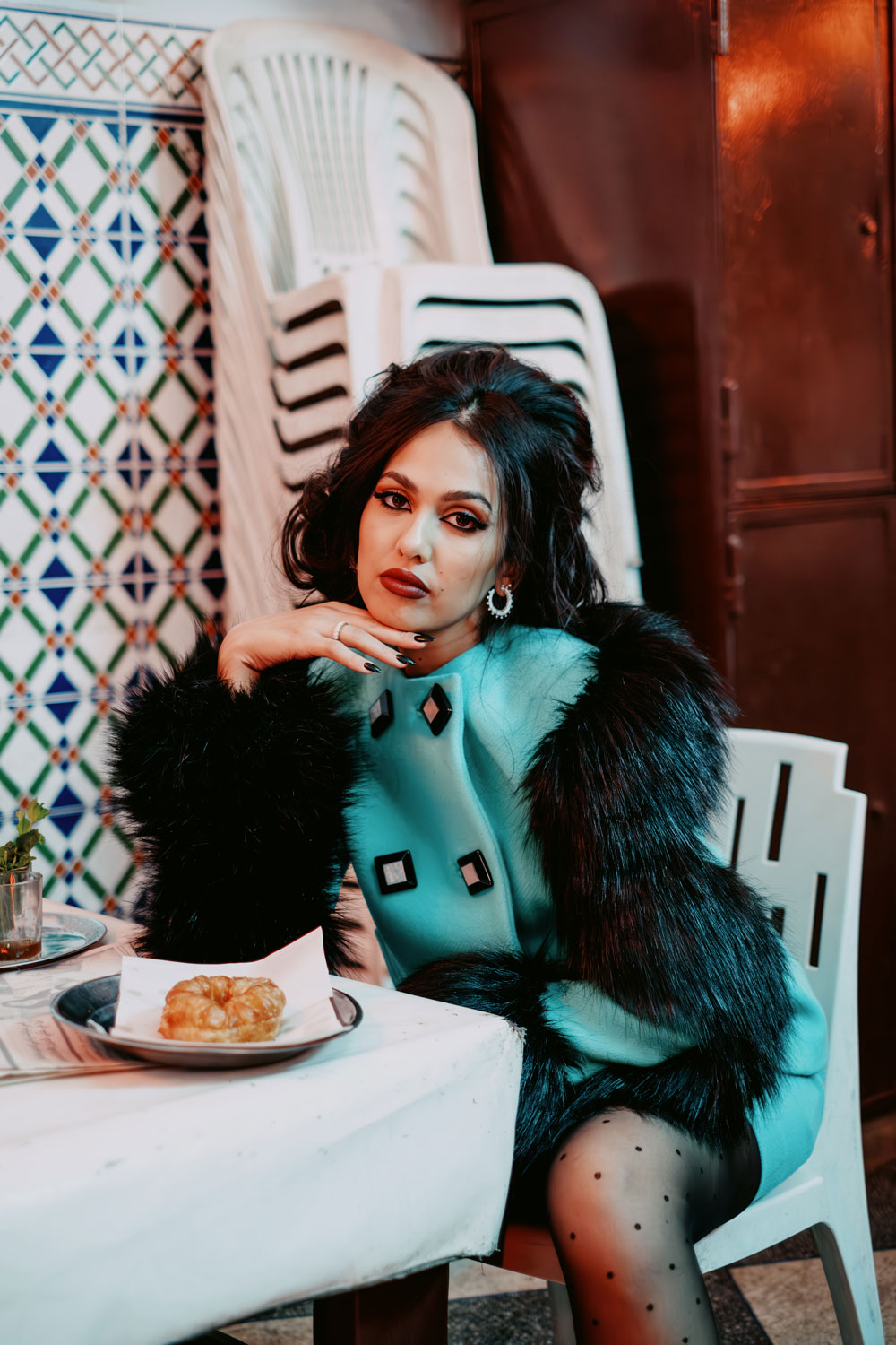 Manal Benchlikha Stuns in Gucci: Moroccan Tea and Chfenj Delight